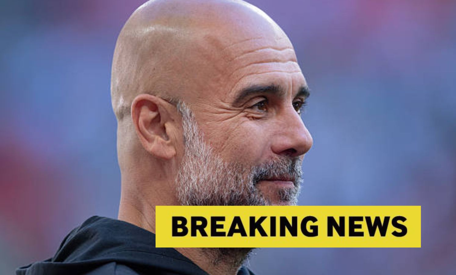 Pep Guardiola looks on