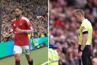 Matheus Cunha celebrating goal and Referee looking at VAR monitor
