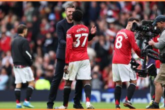 Michael Carrick and Kobbie Mainoo