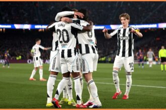 Newcastle players celebrate against Barcelona