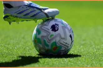 Premier League player with foot on ball