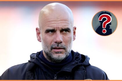 Manchester City manager Pep Guardiola looks on