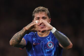 Enzo Fernandez celebrates a goal for Chelsea against Tottenham