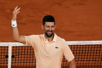 French Open: Novak Djokovic makes Grand Slam history by defeating Giovanni Mpesi Pellicar after dropping first set