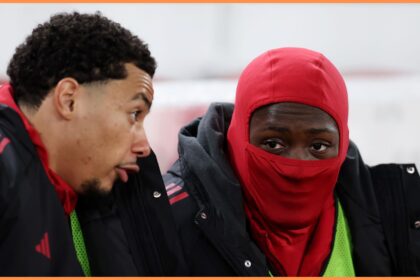 Hugo Ekitike speaks to Ibrahima Konate on the Liverpool bench.