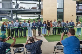 Pritzker and Peoria elected officials celebrate golf learning center
