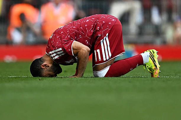 Mohamed Salah bows down at Anfield for the final time