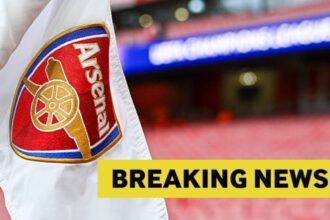 Arsenal flag with breaking news overlay