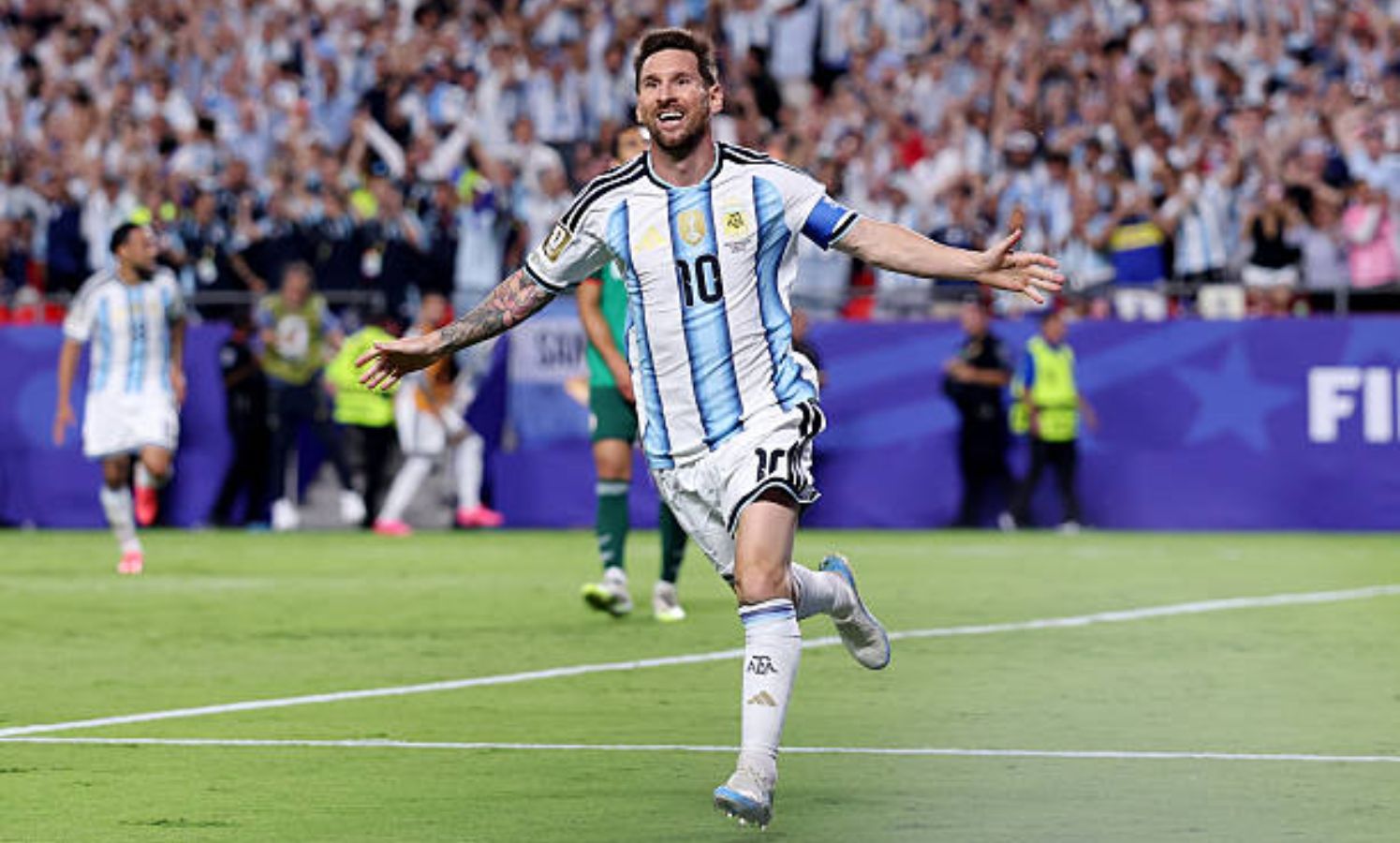 Lionel Messi celebrates record breaking goal