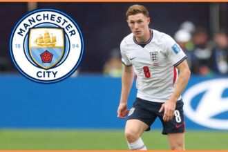Elliot Anderson in action for England and the Manchester City logo