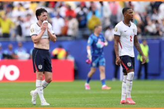 Declan Rice and Ezri Konsa react after England