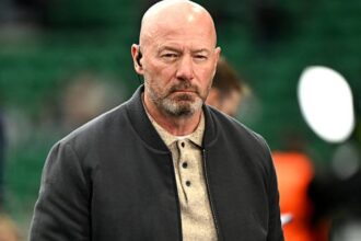 Alan Shearer looks on during a match coverage