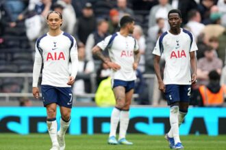 Cristian Romero, Xavi Simons and Pape Matar Sarr after a Spurs game