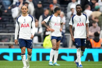 Cristian Romero, Xavi Simons and Pape Matar Sarr after a Spurs game
