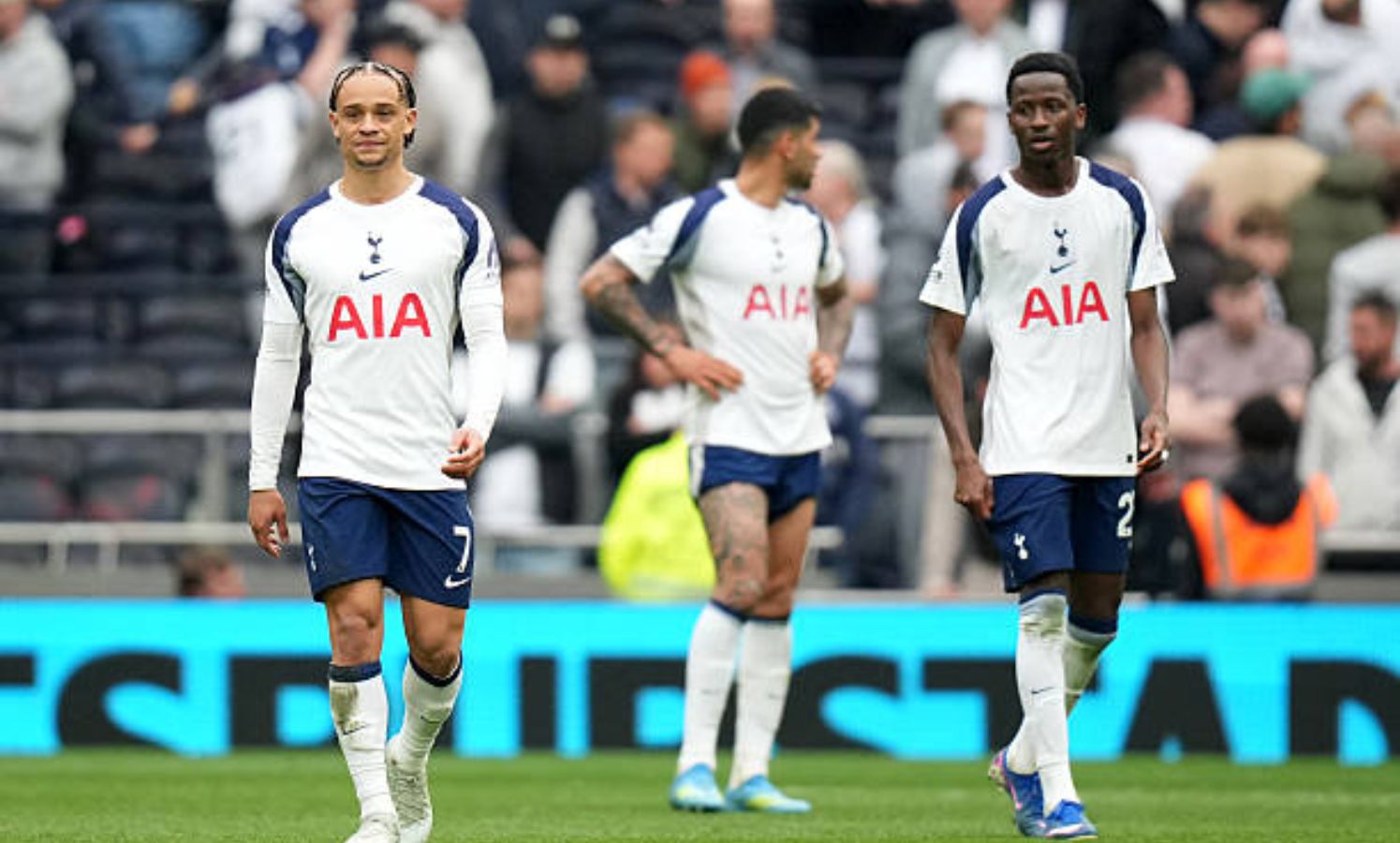 Cristian Romero, Xavi Simons and Pape Matar Sarr after a Spurs game