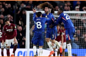 Marc Cucurella celebrates with his Chelsea teammates against West Ham