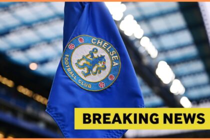 Chelsea logo on corner flag, and breaking news banner