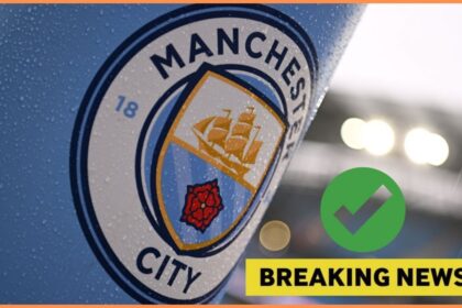 Man City flag with overlay of breaking news