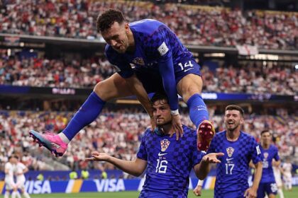 Martin Baturina celebrates after scoring equaliser vs England