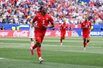 Johan Manzambi celebrates after scoring for Switzerland