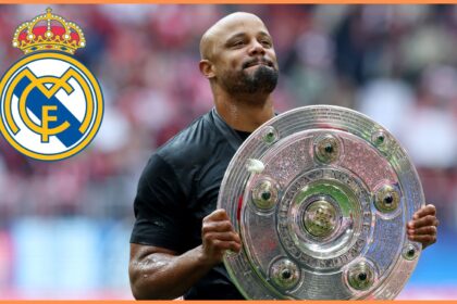 Vincent Kompany celebrating with the Bundesliga trophy