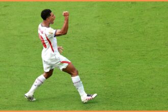 Jude Bellingham celebrates scoring for England against Norway