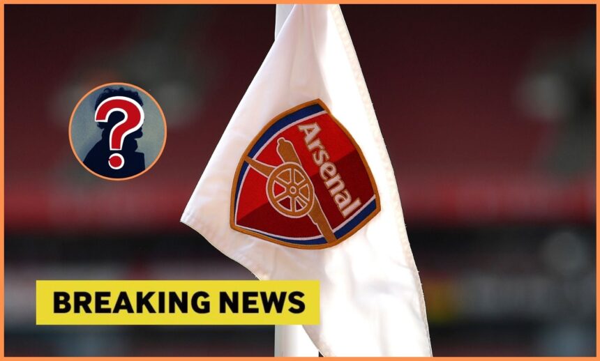 Arsenal logo on corner flag, and breaking news banner