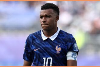 France star Kylian Mbappe looks on