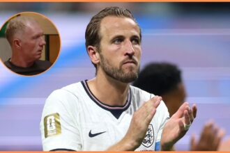 Harry Kane applauds the England fans