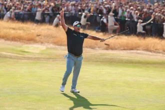 Jul 19, 2026; Southport, ENG; Ryan Fox reacts on the 18th green after putting for a birdie to win The Open Championship golf tournament at Royal Birkdale. Mandatory Credit: Bill Streicher-Imagn Images