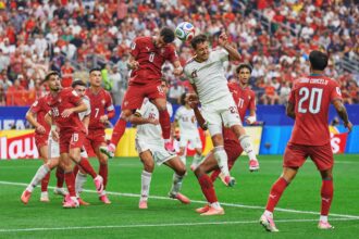 Oyarzabal competes for the ball against Portugal.