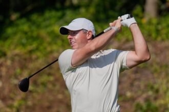 Rory McIlroy plans to return to competition after tough start at Royal Birkdale
