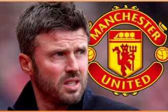 Man United manager Michael Carrick with man united badge