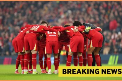 Liverpool players huddle before game