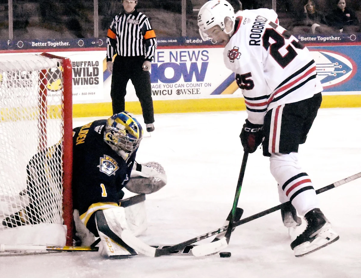 Blackhawks send three players back to junior teams