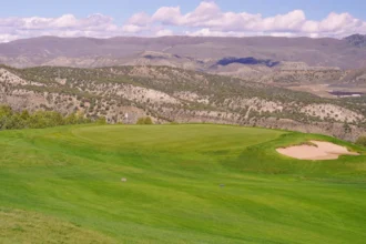 College golf's Red Sky Classic showcases stunning scenery.