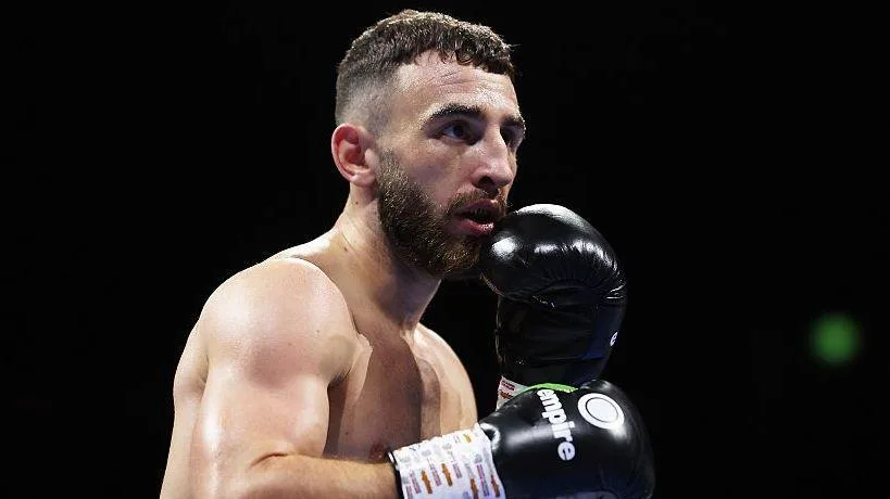 Davies stops Collins in seventh round