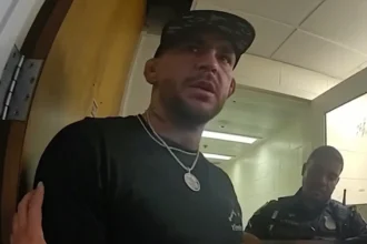 Extended video shows former UFC star Dustin Poirier agitated during arrest and booking