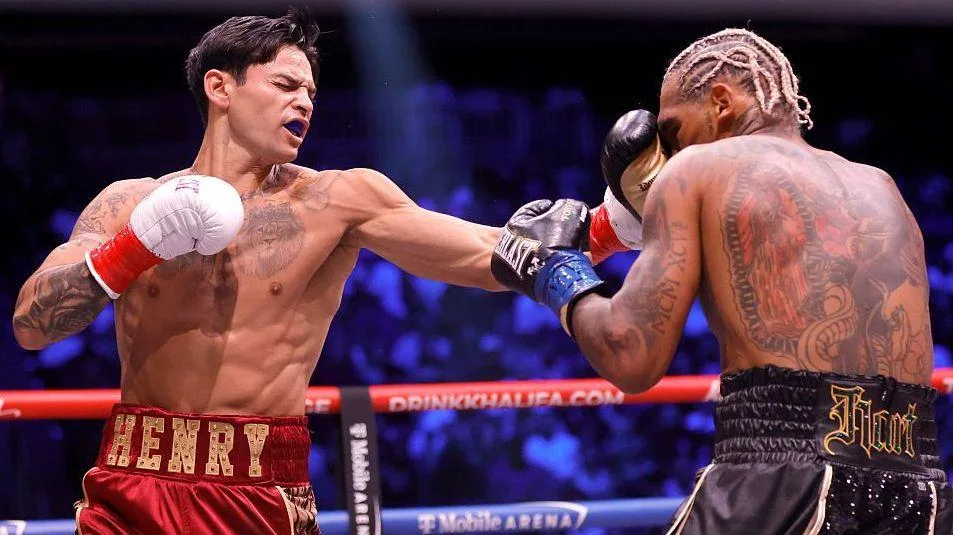 Garcia defeats Benn in two rounds