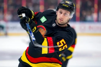 Guillaume Brisebois aims for Canucks' opening roster after recovering from injury