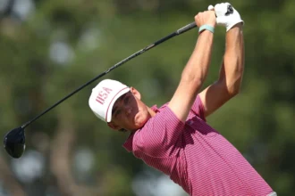 Jackson Koivun showcases golf equipment at the Presidents Cup