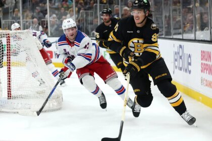 Late goals lead Bruins to opening night victory over Rangers