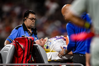 Mets' Jared Young carted off after collision with Nolan McLean at first base