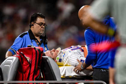 Mets' Jared Young carted off after collision with Nolan McLean at first base