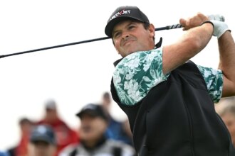 Patrick Reed leads Race to Dubai as top 10 secure PGA Tour cards.
