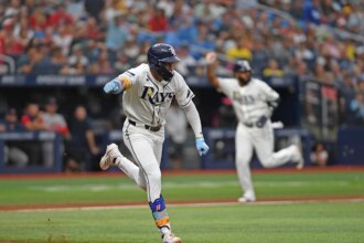 Rays defeat Red Sox 5-1 through October in AL East race