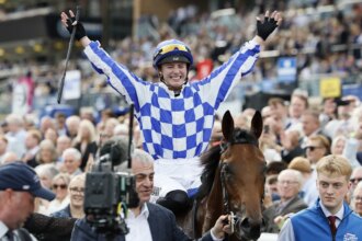 Saffie Osborne becomes first female jockey to win a British Classic