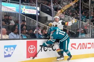 Sharks waive Comrie and Huntington in latest roster cuts