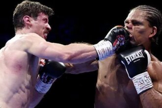 Warburton defeats Heaney in rematch to retain title