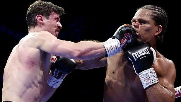 Warburton defeats Heaney in rematch to retain title